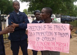 Protestors oppose jailing of FrontPage Africa editor Rodney Sieh in 2011